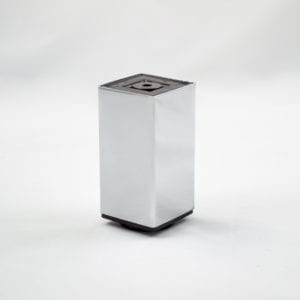 A silver cube sitting on a white surface.