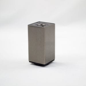 A small metal cube sitting on a white background.