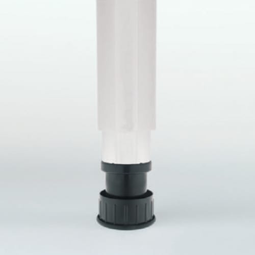 A clear plastic bottle with STUDIO LEGS as the black base and a 2" size.