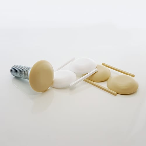 A set of beige COVER CAPS, in 25MM size, on a white surface.