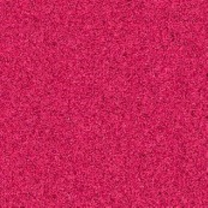 A close up image of a textured surface with a pink hue.