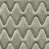 A close up of a grey fabric with a wavy pattern featuring Procyon UNO.