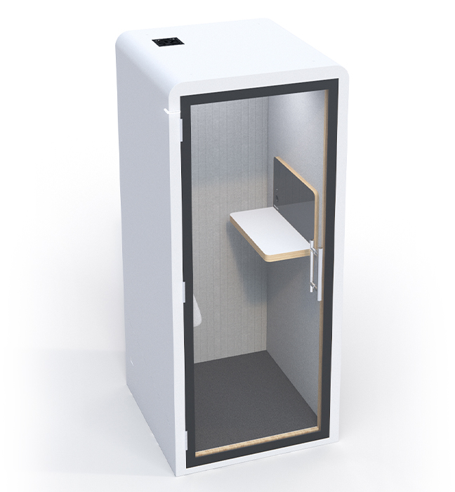 A white cubicle with a shelf and a desk.