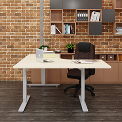 Three leg ergonomic height adjustable desk, gray color, office environment